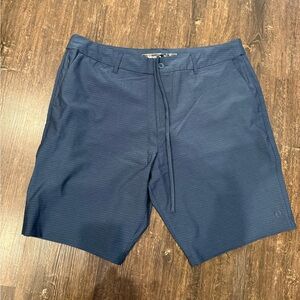 NWOT men’s Hang Ten Dark Blue Flat Front Shorts, size 38.